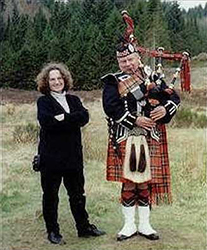 Susan with a bagpiper